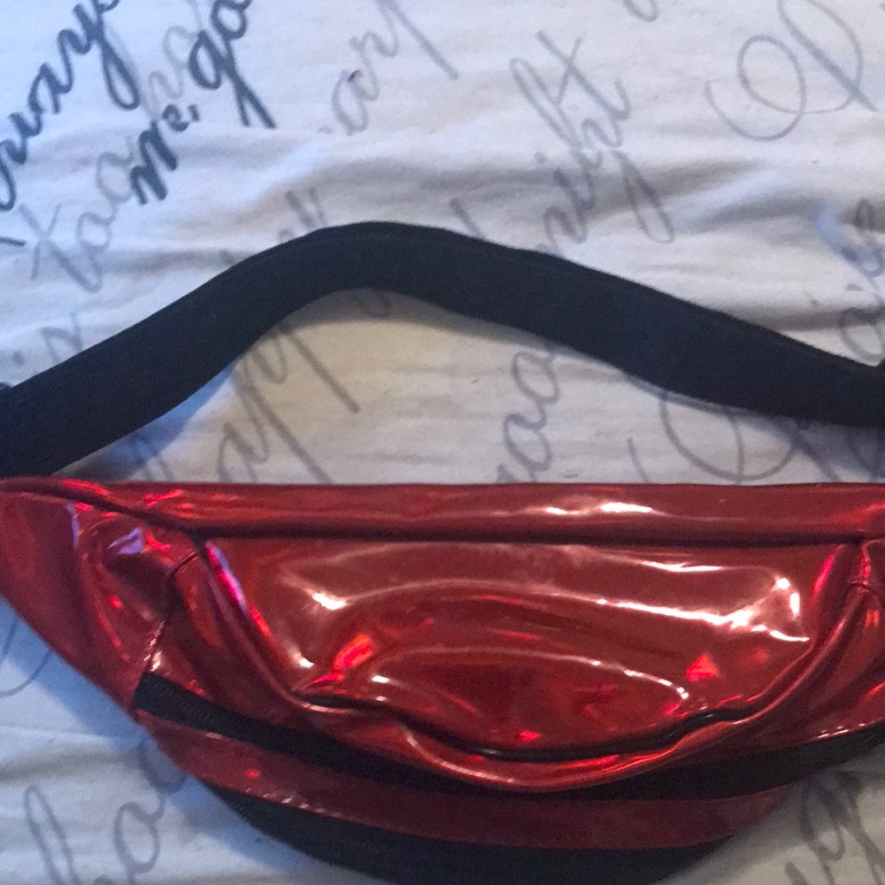 A red glossy Fannypack.